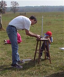 Bill and Alexander launch a rocket