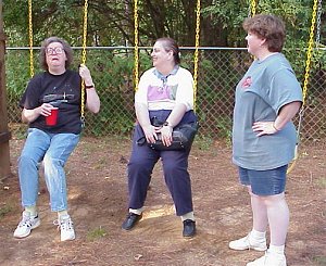 The ladies gather at the swings